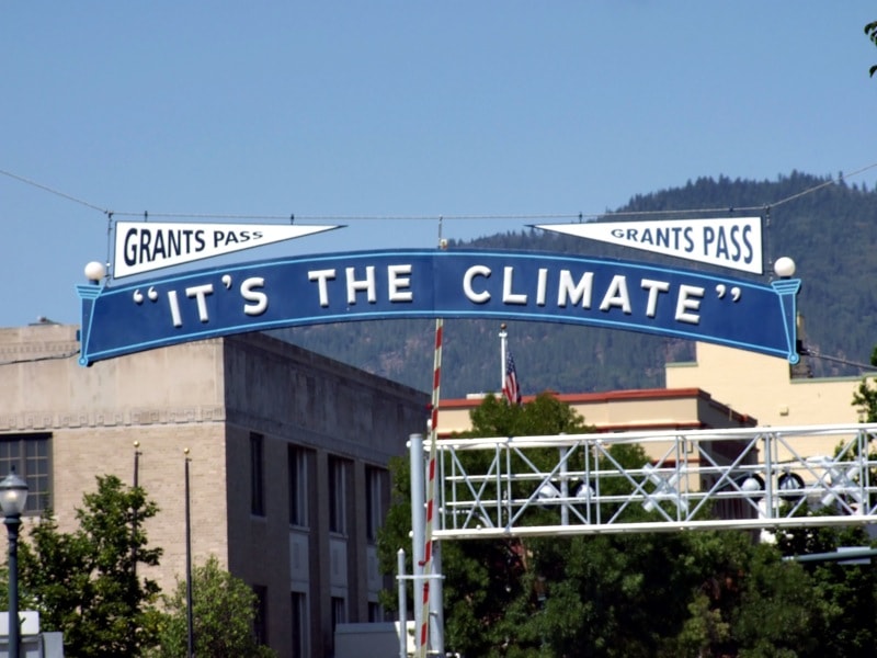 Grants Pass 'It's The Climate' sign in downtown Grants Pass, Oregon